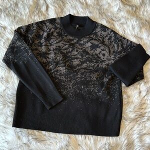 A t h l e t a • Black mountain patterned mock neck sweater